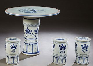 Blue and White Porcelain Table and Stools (4 Pcs.) Provenance: Palmira, the Estate of Sarkis Kaltakdjian (Sarkis Oriental Rugs), Prairieville, Louisia