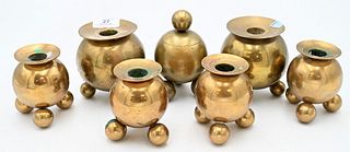 Seven Brass Pieces, to include four Gusums Bruk candlesticks; one Gusum Bruk inkwell; along with two candlesticks after Gusums Bruk, tallest 4 1/8 inc