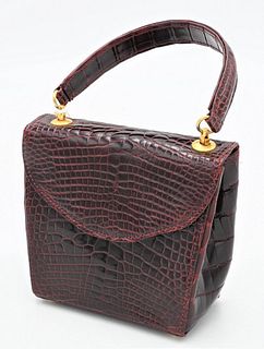 Giorgio's of Palm Beach Handbag, burgundy alligator clutch purse, new with tags, $2,950., having shoulder strap inside, height 5 inches, width 5 inche