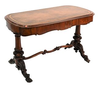 George IV Rosewood Writing Table, having inset leather top, two drawers on carved pedestal bases, scroll stretcher, circa 1850, height 28 inches, top 