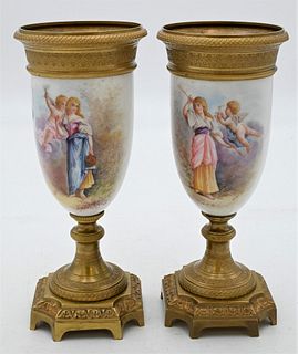Pair of French Porcelain and Bronze Garniture Urns, each having gilt bronze top over painted scene with maiden and putti figure, on bronze base, heigh