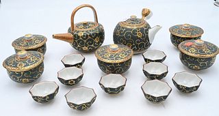 16 Piece Japanese Porcelain Tea and Coffee Set, having enamel and heavy gold painted decoration, signed on bottom, tallest 5 1/4 inches.