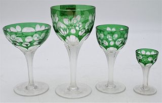Set of 41 Green Cut to Clear Stemware, to include 12 red wines; 12 white wines; 8 champagne; along with 9 stemmed cordials having etched flowers and l