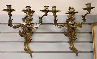 Lot of Brass and Bronze, to include three brass wall sconces, a pair having foliate motif arms, one sconce having three arms and flower form drip pans