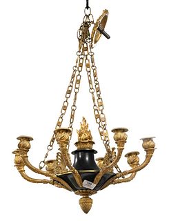 French Empire Style Hanging Light, having eight gilt bronze torch light holders with green patinated metal body, height 11 inches, diameter 18 inches.