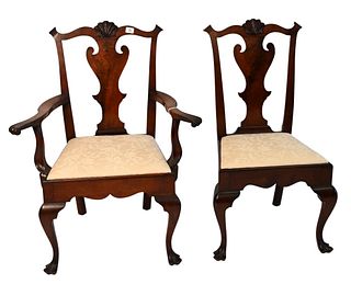 Set of Eight Walnut Pennsylvania Style Handmade Dining Chairs, having shell carved backs and trifed foot, all chairs are mortised and pinned, to inclu