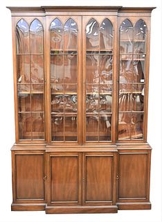 Custom Mahogany Breakfront, in two parts, having four glazed doors along with adjustable shelves, height 88 inches, width 62 inches.