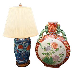 Two Chinese Porcelain Vases, to include a large moon flask having dragon handles, 19 inches; along with a blue with red flower vase, made into a table