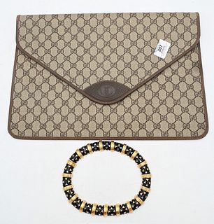 Two Piece Designer Group, to include Judith Leiber enameled necklace in original box, along with Gucci canvas monogrammed pouch, 11 x 16 1/2 inches, P