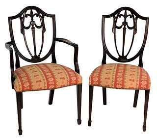 Set of Eight Custom Mahogany Dining Chairs, having a Prince of Wales plume carved shield back, along with fully upholstered seats, two arm, six side, 