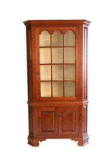 D.R. Dimes Cherry Corner Cabinet, on ogee feet, height 85 1/2 inches, depth on side 24 inches.