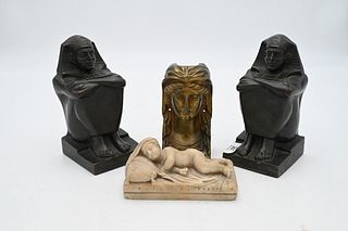Four Piece Assorted Group, to include a pair of bronze pharaoh bookends; carved marble figure of a young child sleeping; along with a brass bust of a 