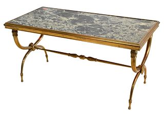 French Brass Coffee or Low Table, possibly Maison Jansen or Bagues, having brass frame with marble table, height 19 1/2 inches, 20 x 40 inches.