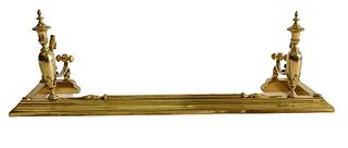 Brass Fire Rail, having urns with scroll supports, 19th century, height 17 1/2 inches, width 54 inches.