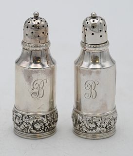 Tiffany & Company Sterling Silver Salt and Pepper, having repousse bottom band, marked Tiffany & Co. 7303 M 5143, height 3 3/4 inches, 4.1 t.oz, Prove