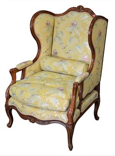 Louis XV Style Bergere, having custom upholstery and bolster pillow, height 42 inches, width 28 inches.