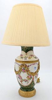 French Porcelain Vase, having painted flowers, mounted with gilt bronze swag on bronze base, made into a table lamp, poorly repaired top, height of va