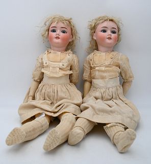 Pair of German Bisque Head Twin Dolls, both marked Handwerk Germany 7 1/2, total height 25 inches each.