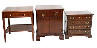 Three Piece Lot, to include a small mahogany Henkel Harris chest, height 22 inches, top 14 x 24 inches; along with two mahogany stands.