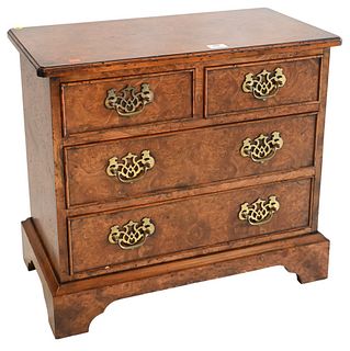 Burlwood Diminutive Chest, two over two drawers on bracket base, height 23 1/2 inches, top 14 x 26 inches.