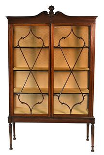 Sheraton Style Mahogany Crystal Cabinet, having glazed doors on fluted legs, height 75 inches, width 45 1/4 inches.