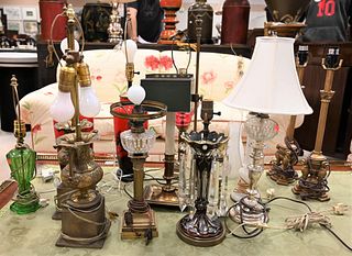 Group of Lamps, to include a pair of red and black Bristol glass lamps; a pair of pot metal urn lamps; a Victorian ruby and clear lamp; along with var