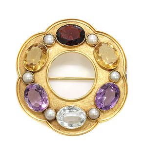 A Victorian gold gemstone set hexafoil circle brooch,