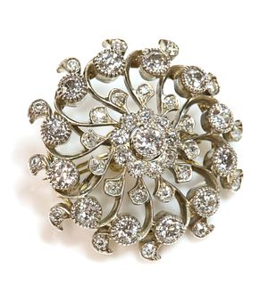 A Victorian diamond set Catherine wheel form target brooch/pendant, c.1890,