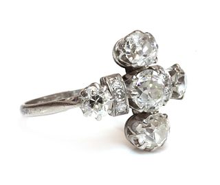 A five stone diamond cruciform ring,