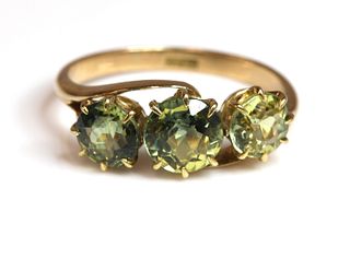 An Edwardian three stone sapphire ring,