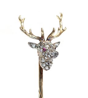 A diamond set stag head stick pin,