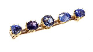 A five stone sapphire bar brooch,