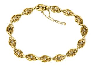 A Continental gold split pearl bracelet, c.1910,