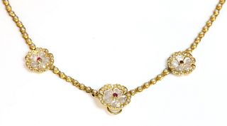 A gold ruby, moonstone and split pearl necklace, c.1900,