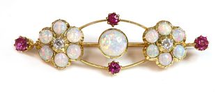 A late Victorian diamond opal and ruby bar brooch,