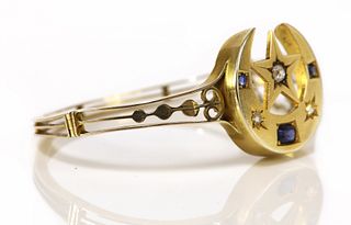 An Edwardian sapphire and diamond closed crescent and star bangle, c.1905,