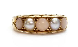 A late Victorian five stone coral and split pearl boat shaped ring,
