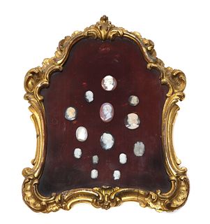 Fourteen unmounted carved hardstone oval and circular cameos,