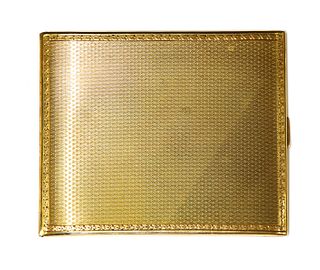 A 9ct gold rectangular cigarette case, by Adie Brothers Ltd.,