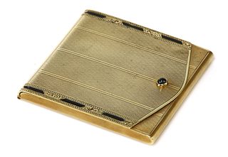 A Continental gold match book case,