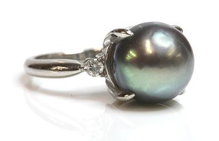 A cultured Tahitian pearl and diamond ring,