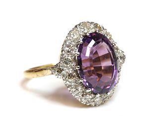 An amethyst and diamond oval cluster ring,