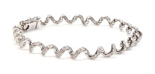 An 18ct white gold diamond set spiral link bracelet,