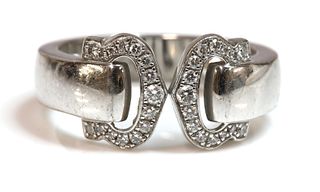 An 18ct white gold diamond set 'C de Cartier' ring, by Cartier,