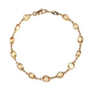 A gold hessonite garnet bracelet,