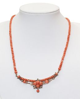 An Edwardian coral and simulated pearl necklace,