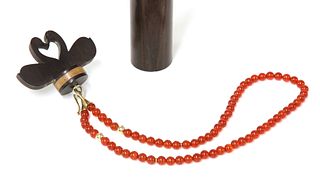A 9ct gold cornelian bead necklace, by Clare Murray,