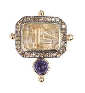 A gold rutilated quartz, iolite and diamond brooch,