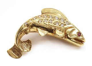 An 18ct gold diamond and ruby fish brooch,