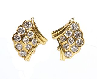 A pair of 18ct gold diamond set earrings,